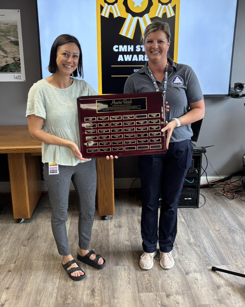 Charlotte Bourne receiving award